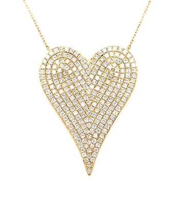 18K yellow gold heart pendant paved with round diamonds on a delicate chain.