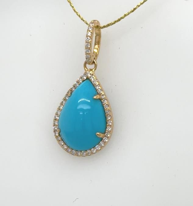 18K yellow gold teardrop pendant with cabochon turquoise and diamond halo bail.