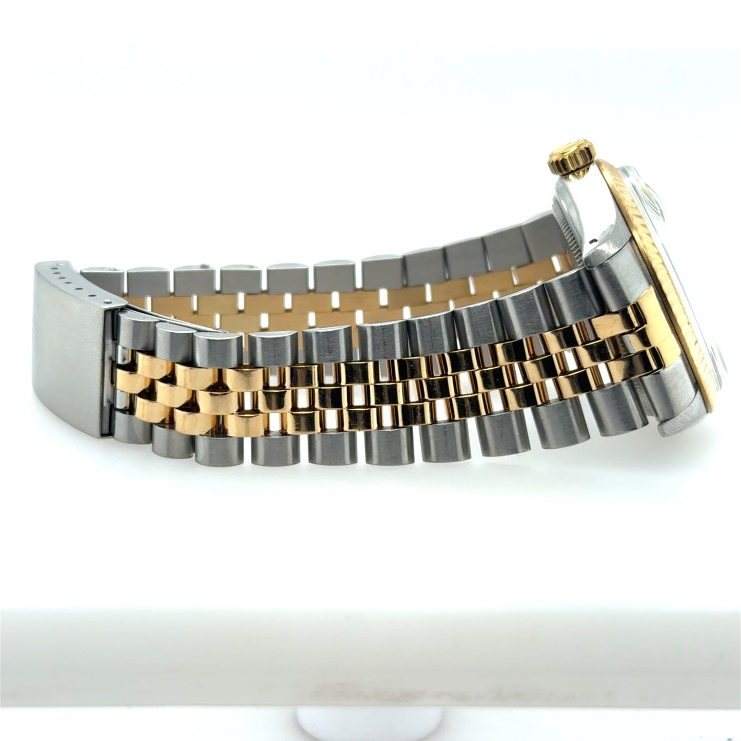 Two-tone stainless steel and yellow gold Jubilee bracelet with fluted bezel side view.