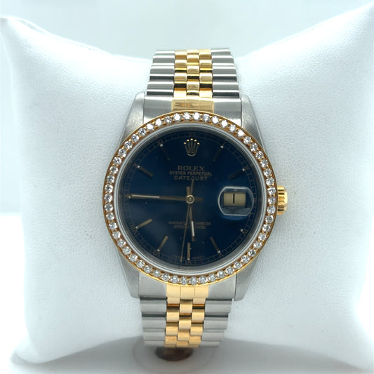 Two-tone steel and yellow gold Datejust with blue dial, diamond bezel, jubilee bracelet.