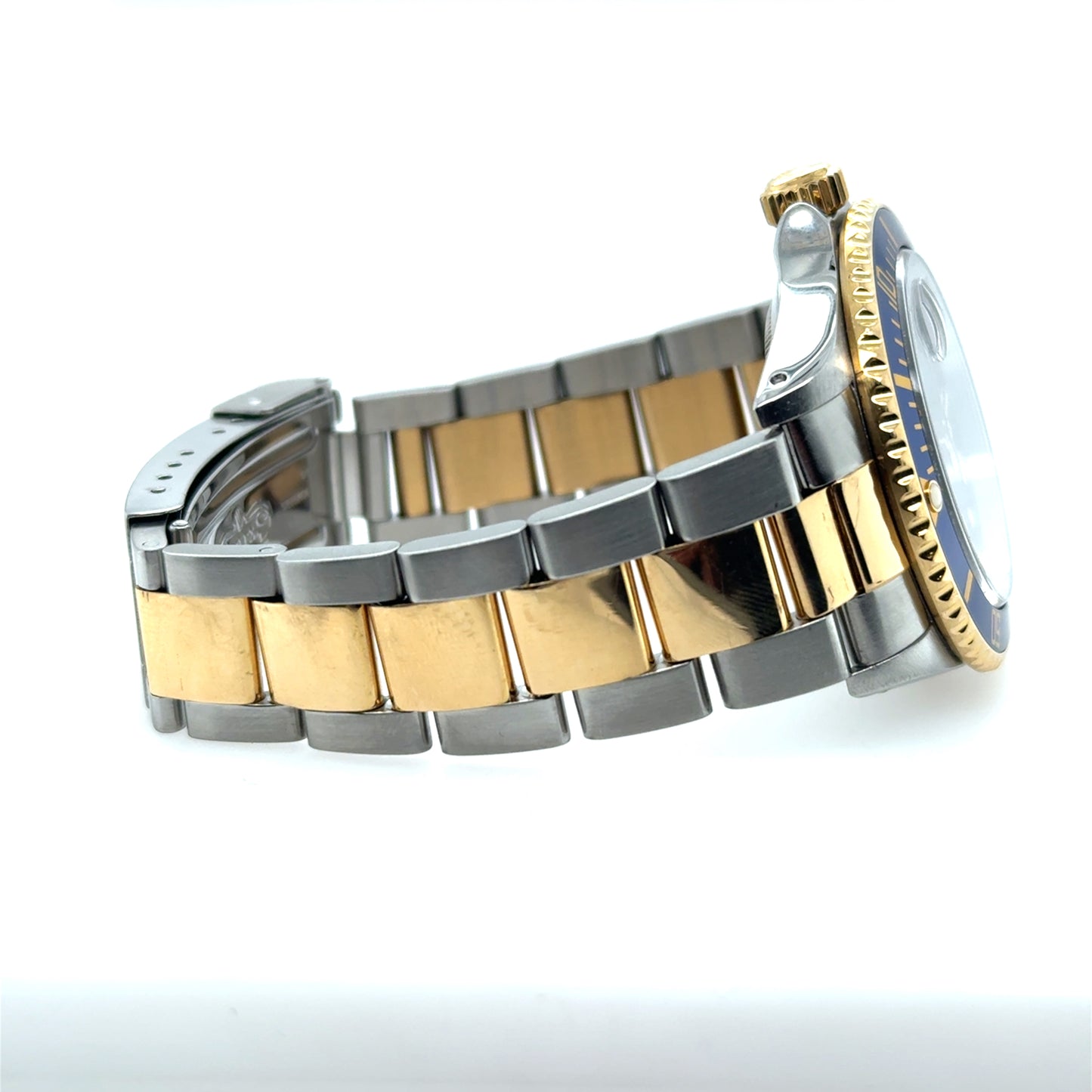 Two-tone stainless steel and yellow gold bracelet Submariner with blue bezel and Fliplock clasp.