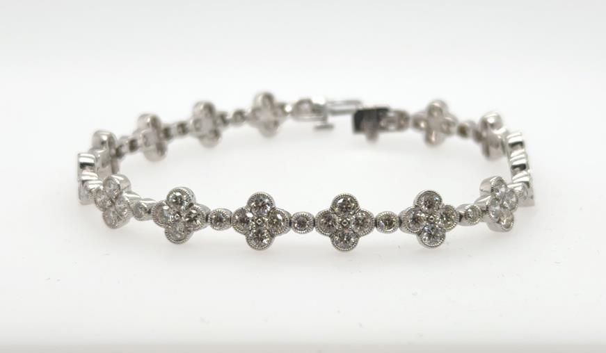 14K White Gold Clover Diamond Tennis Bracelet.