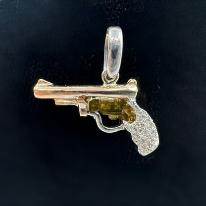 14K rose and white gold pistol pendant with brown-yellow diamond and pavé handle.