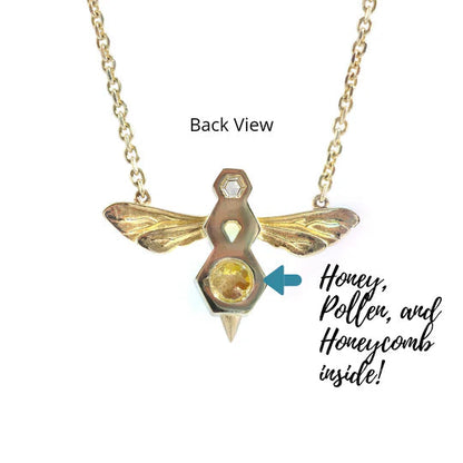 14K yellow gold bee pendant on cable chain, hexagon diamond and amber accents.