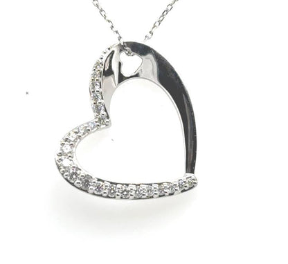 14K white gold open heart pendant with shared-prong diamonds on cable chain.