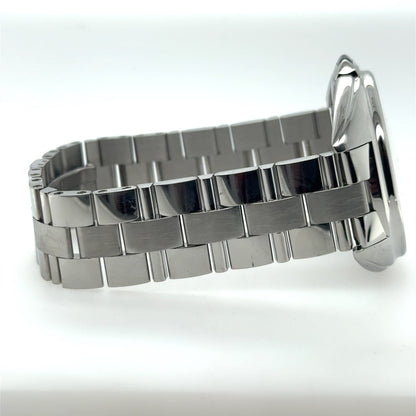 Stainless steel watch showing side profile with polished case and brushed link bracelet.