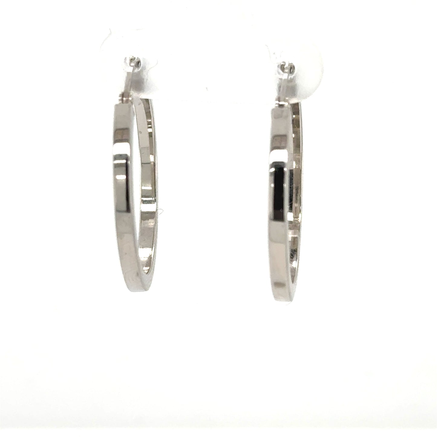 Pair of 14K white gold square-tube hoop earrings with post backs.