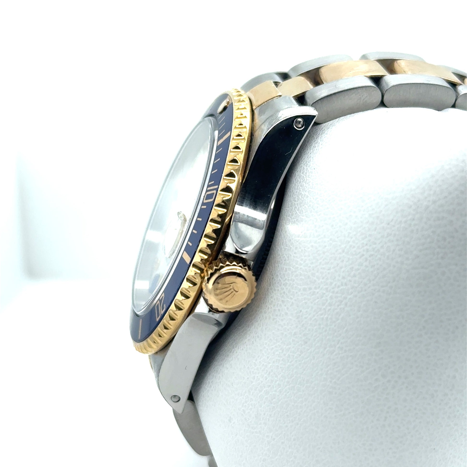 Two-tone steel and gold Submariner, blue bezel, gold crown, Oyster bracelet.