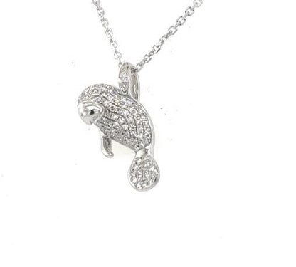 14K white gold diamond pavé manatee pendant with hidden bail on cable chain.