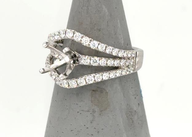 18K white gold semi-mount ring with triple diamond pavé split shank setting.