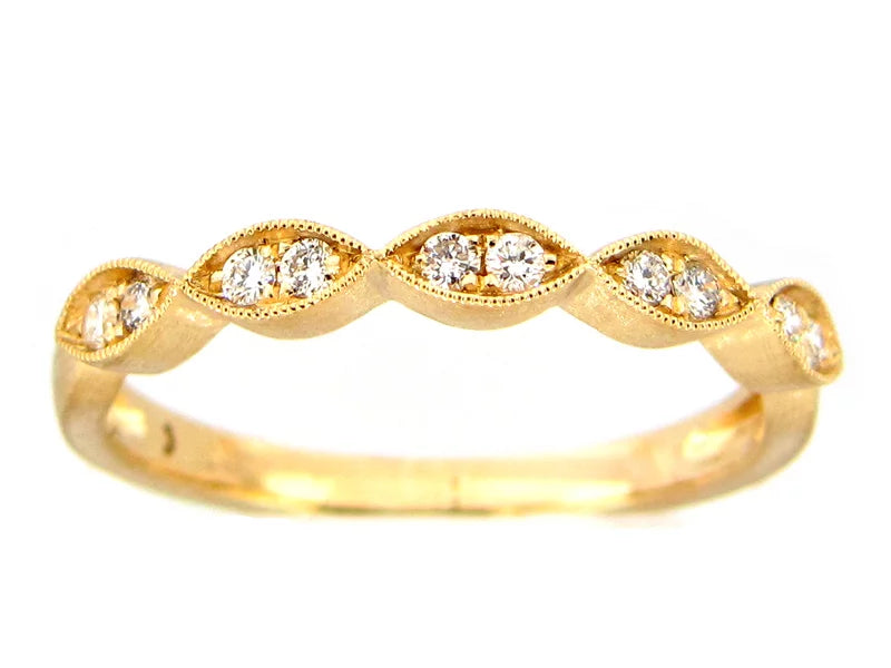 14K yellow gold stackable band with milgrain marquise stations and round diamonds.