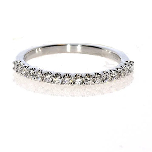 18K white gold band with a straight row of round diamonds.