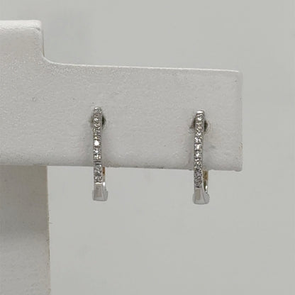 14K White Gold Diamond Huggie Earrings - 0.08ctw Round Cut