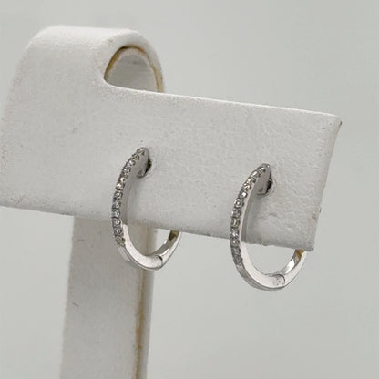 14K White Gold Diamond Huggie Earrings - 0.08ctw Round Cut