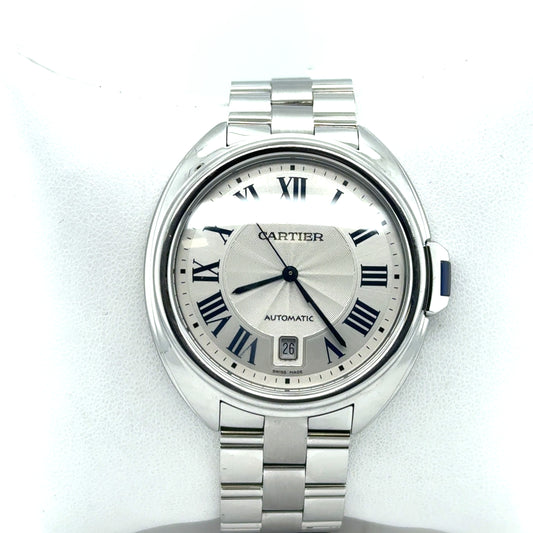 Stainless steel Cle de Cartier 40mm watch with silver sunray dial, blue Roman numerals, date at 6, and