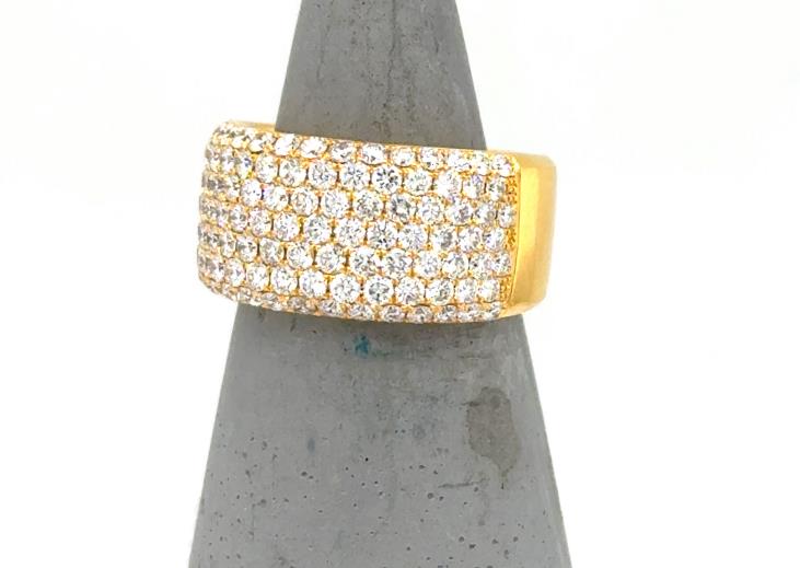 Wide 14K yellow gold band with seven rows of pave-set round diamonds.