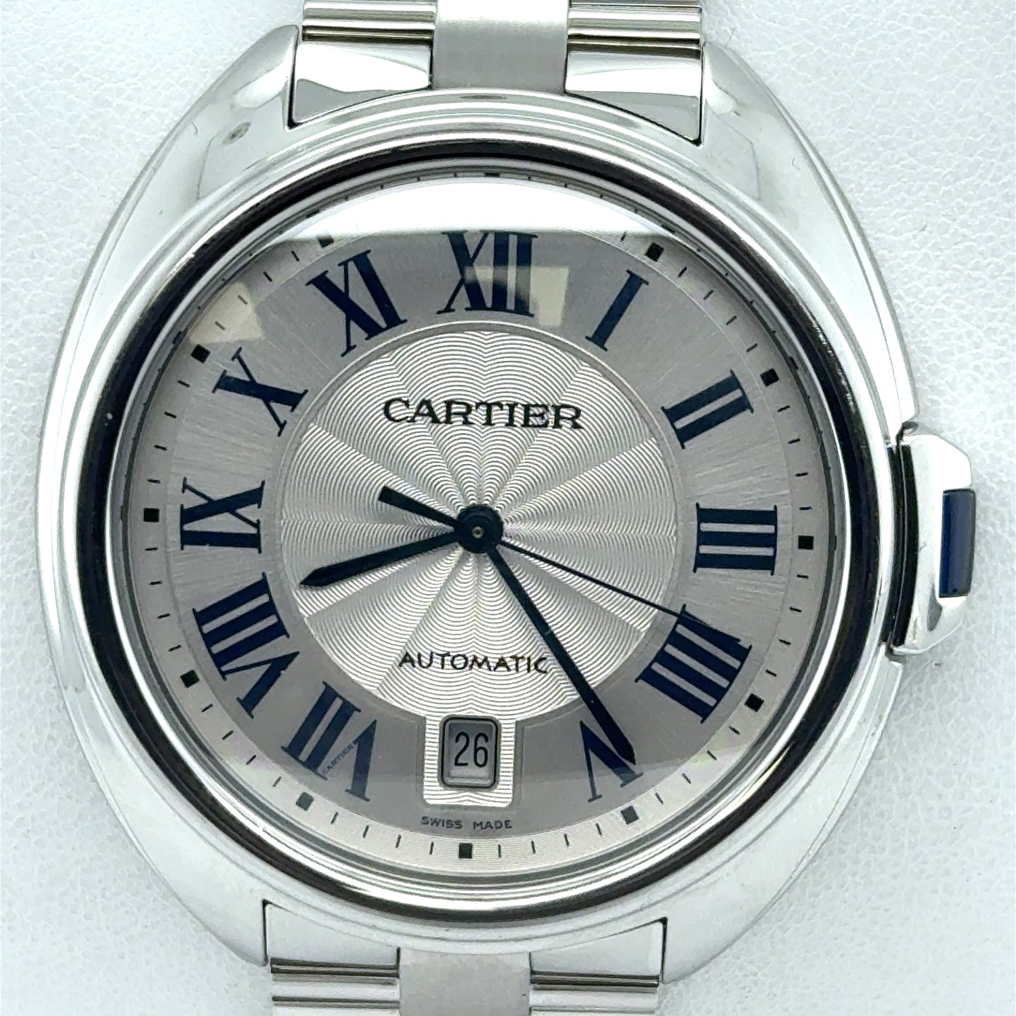 Stainless steel Cartier Cle de Cartier watch with silver sunray dial, blue Roman numerals, date at 6.