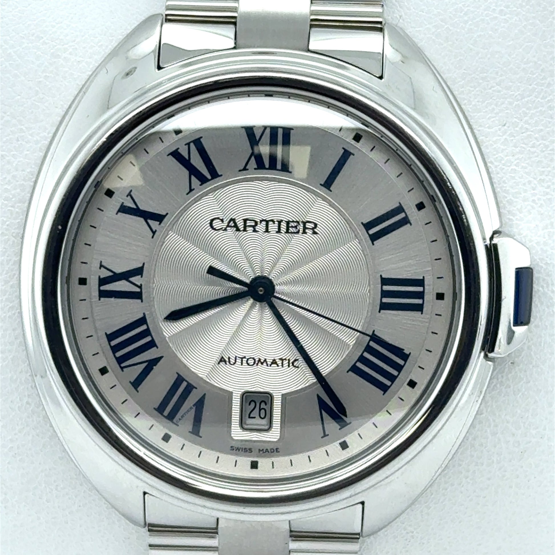 Stainless steel Cartier Cle de Cartier watch with silver sunray dial, blue Roman numerals, date at 6.