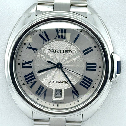 Stainless steel Cartier Cle de Cartier watch with silver sunray dial, blue Roman numerals, date at 6.