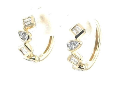 14K yellow gold huggie earrings with alternating baguette and pear-shaped diamonds.