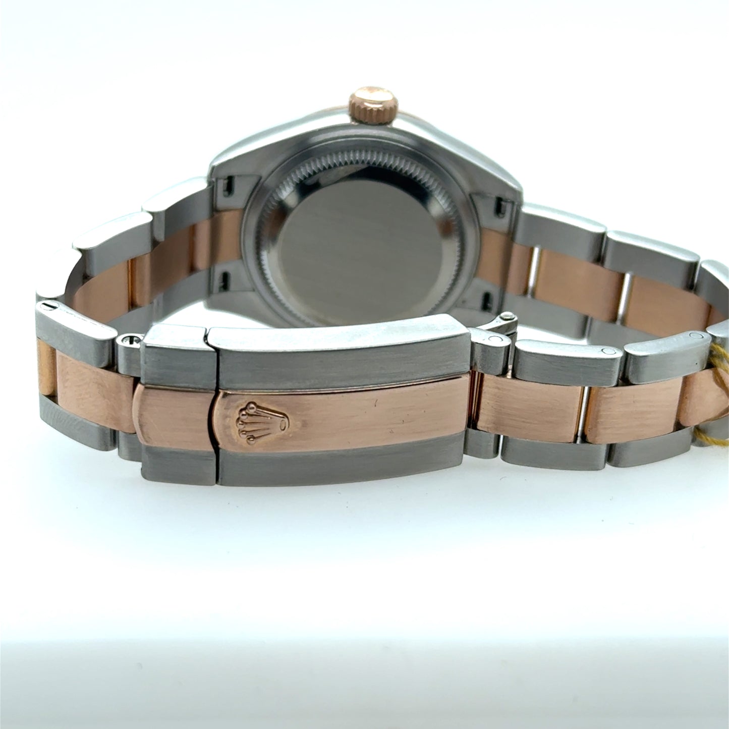Two‑tone stainless steel and rose gold Oyster bracelet with folding clasp.