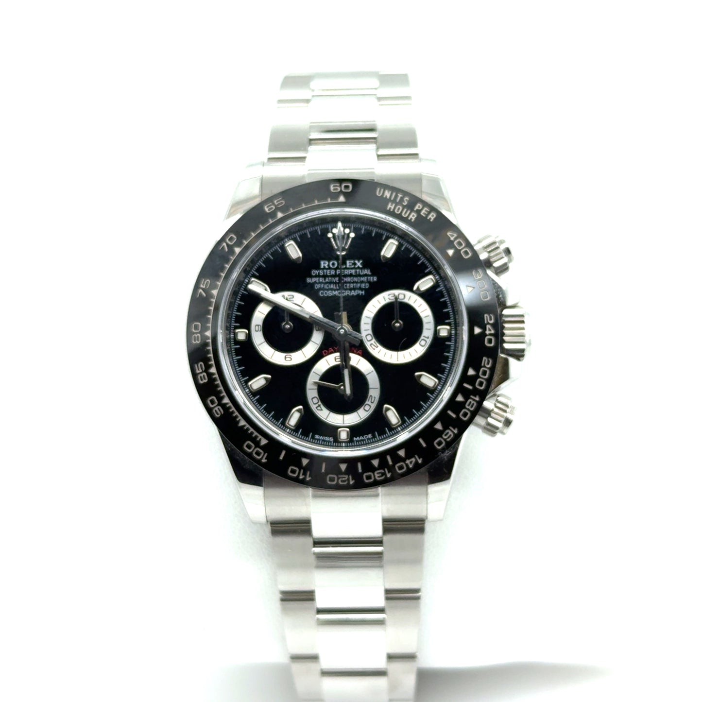 Stainless steel chronograph watch with black dial, ceramic tachymeter bezel, Oyster bracelet.