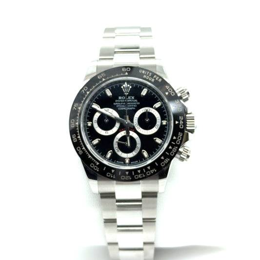 Stainless steel chronograph watch with black dial, ceramic tachymeter bezel, Oyster bracelet.