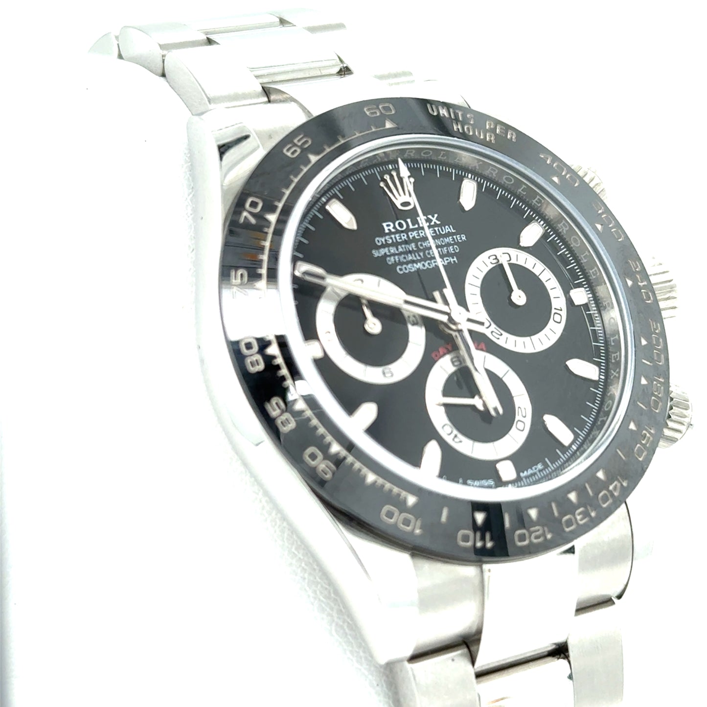 Stainless steel chronograph watch with black dial, ceramic tachymeter bezel, and Oyster bracelet.