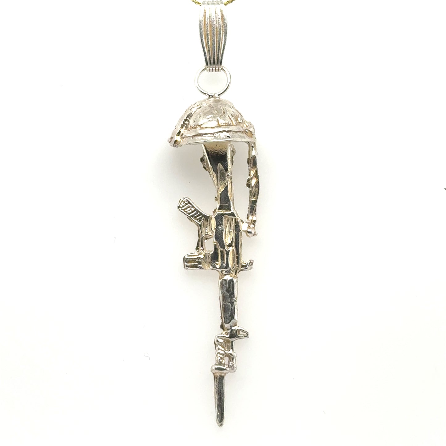 Sterling silver battlefield cross pendant with rifle, helmet, and textured bail.