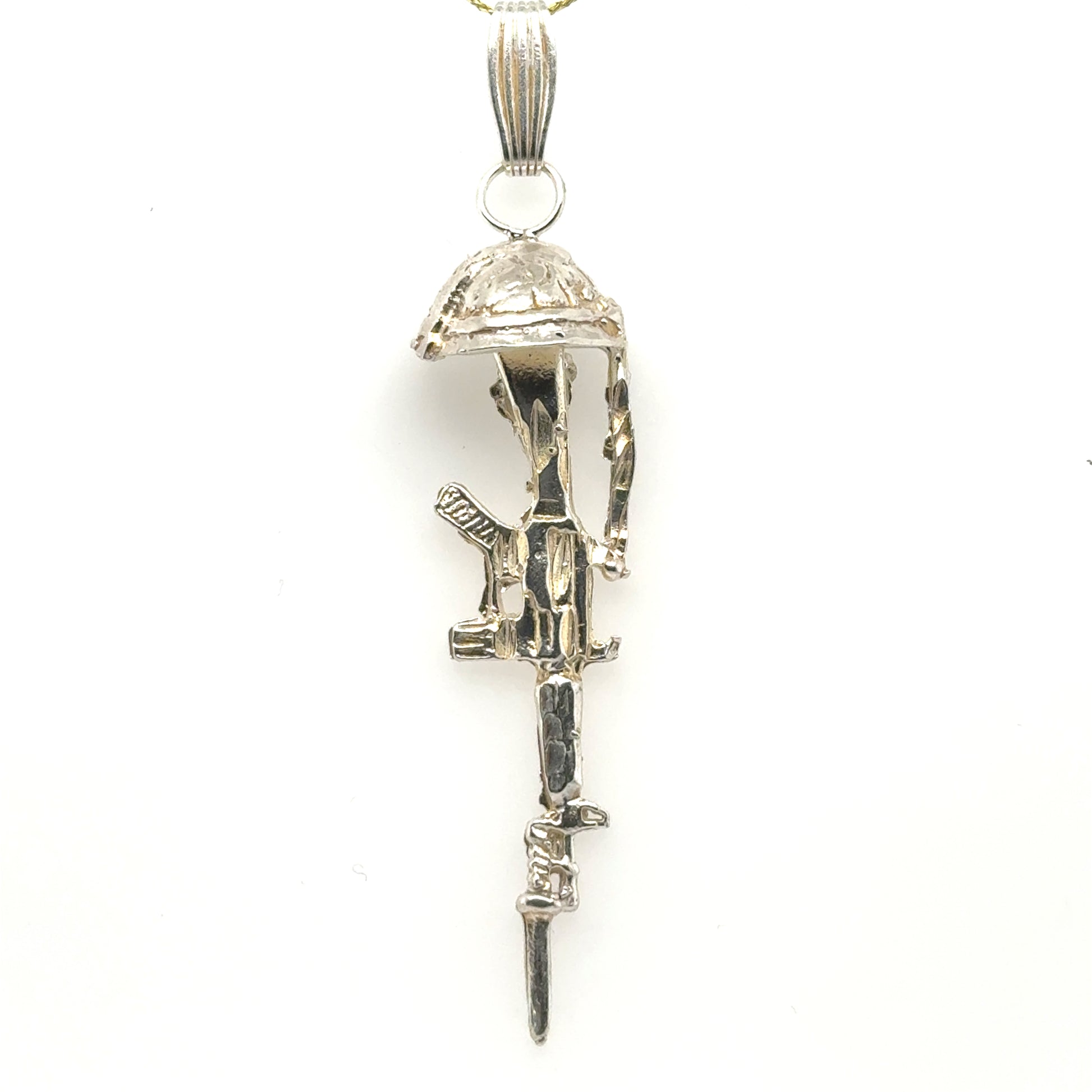 Sterling silver battlefield cross pendant with rifle, helmet, and textured bail.