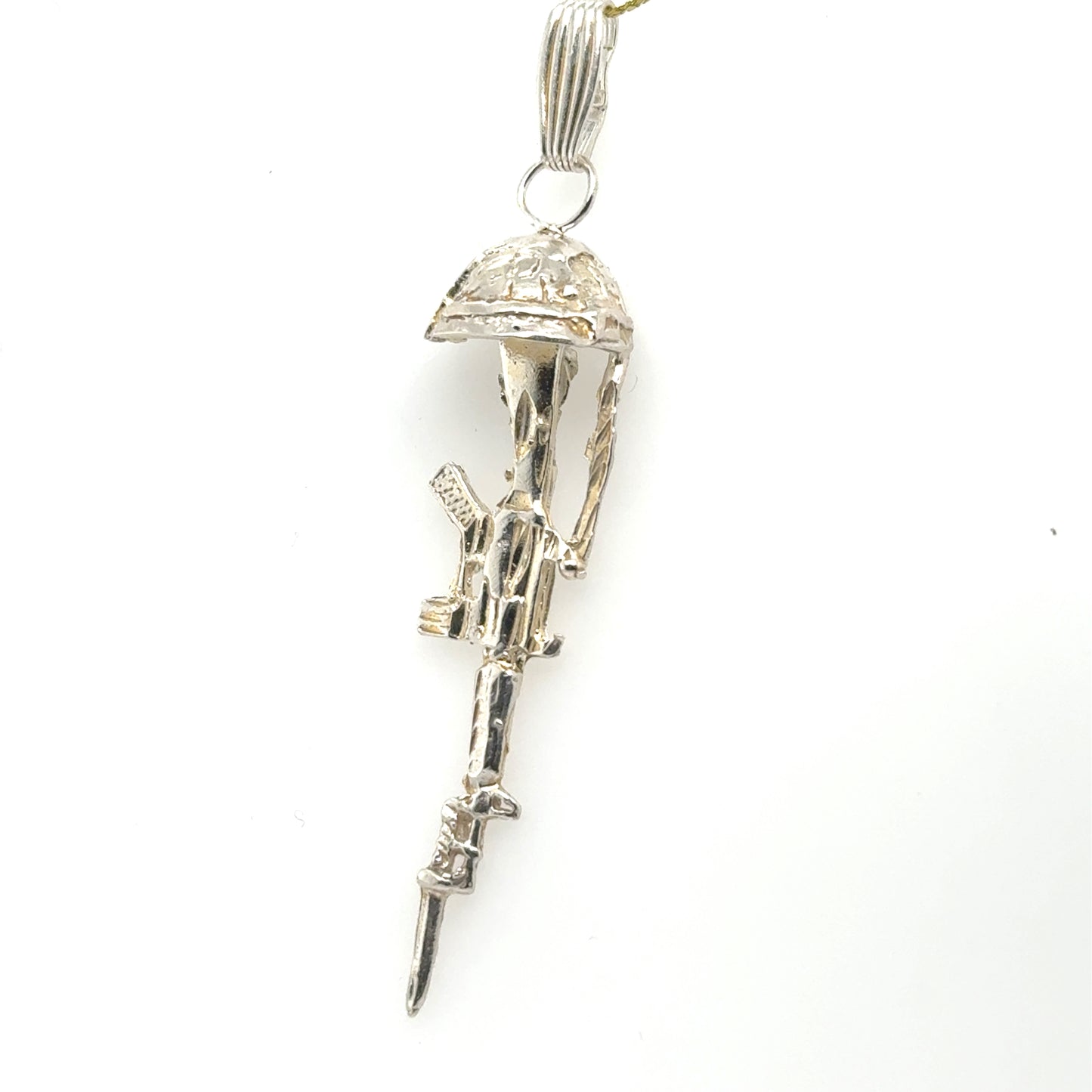 Sterling silver battlefield cross pendant with rifle, helmet, and textured bail.