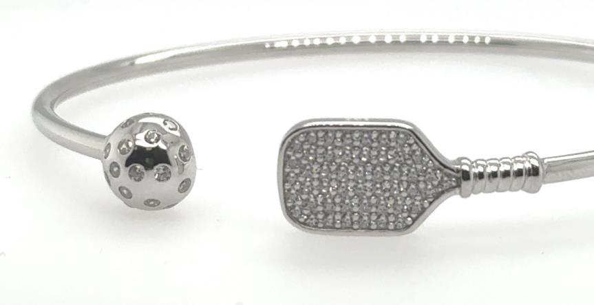 Sterling silver open cuff bracelet with CZ-studded paddle and perforated ball motifs.