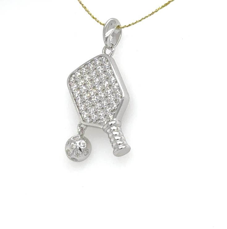 Sterling silver pickleball paddle pendant with pave cubic zirconia and dangling ball.