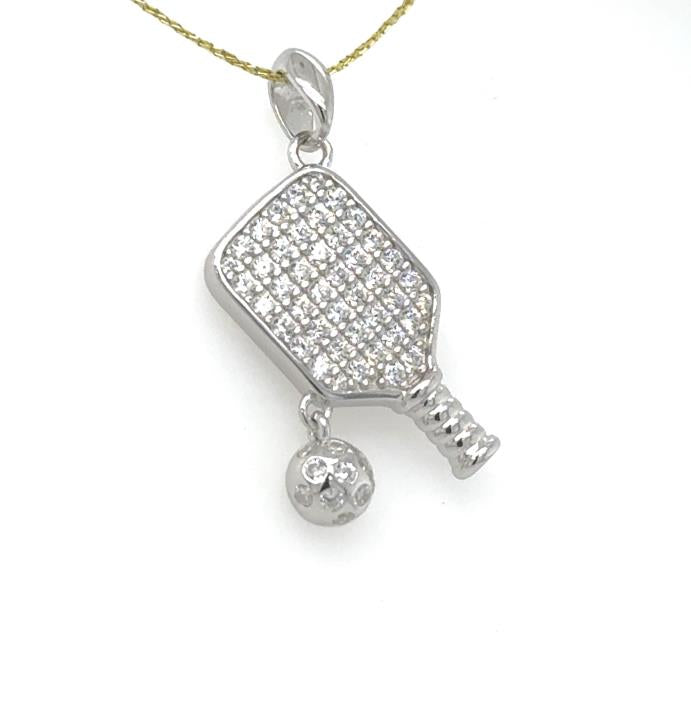 Sterling silver pickleball paddle pendant with pavé cubic zirconia and dangling ball charm.