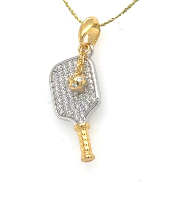 Two-tone pickleball paddle pendant with pavé CZ, gold bail, handle, and ball.