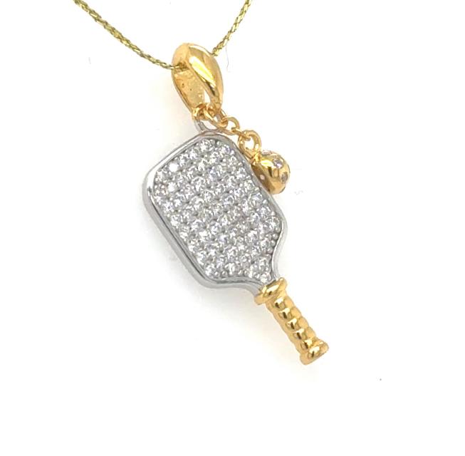 Two-tone pickleball paddle pendant with pave cubic zirconia, gold handle and bail.