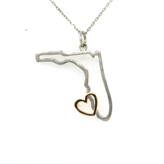 Sterling silver Florida outline pendant with a small 14K rose gold heart.