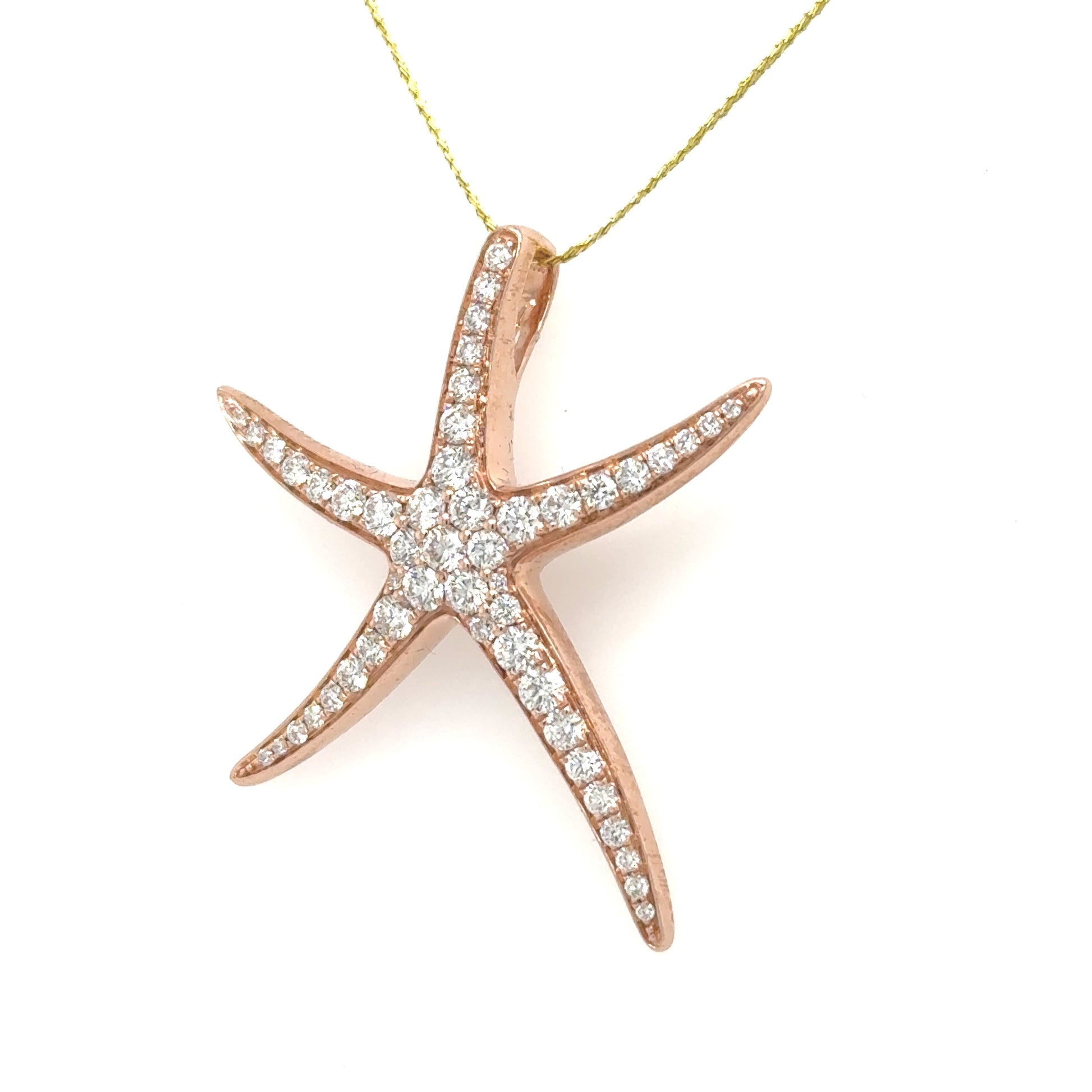 Rose gold starfish pendant paved with round diamonds, hidden bail, no chain.