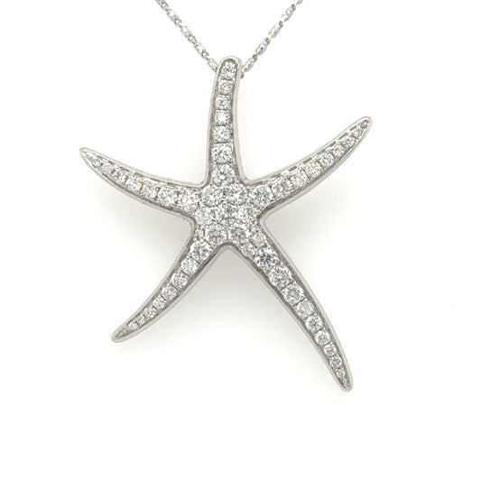 14K white gold starfish pendant pavé-set with round diamonds, hidden bail.